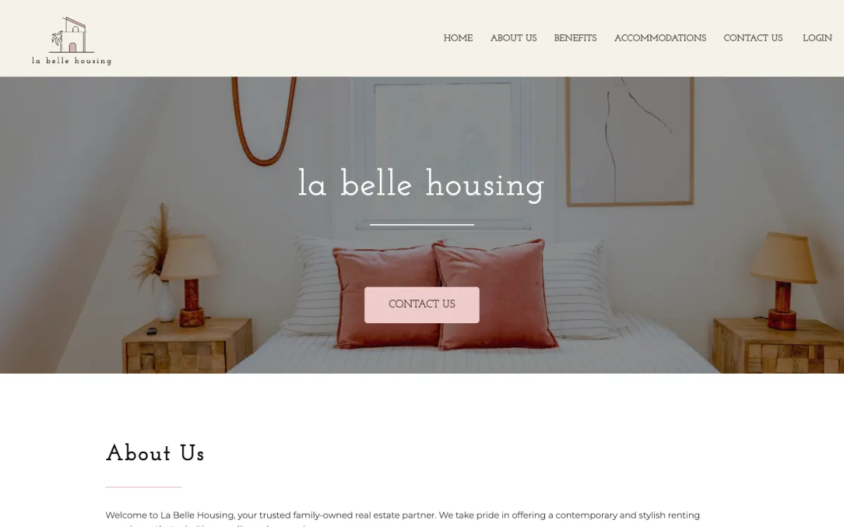 La Belle Housing home page: the name over a bedroom with terracotta cushions, a Contact us button and the About us section